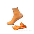 Schaumkleber -Slipper Anti -Slip -Socken mit Gummi